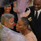 George Clooney greets Serena Williams as Sabrina Dhowre and Idris Elba (top) look on at St. George’s Chapel on May 19, 2018, in Windsor, England, for the wedding of Prince Harry and Meghan Markle.